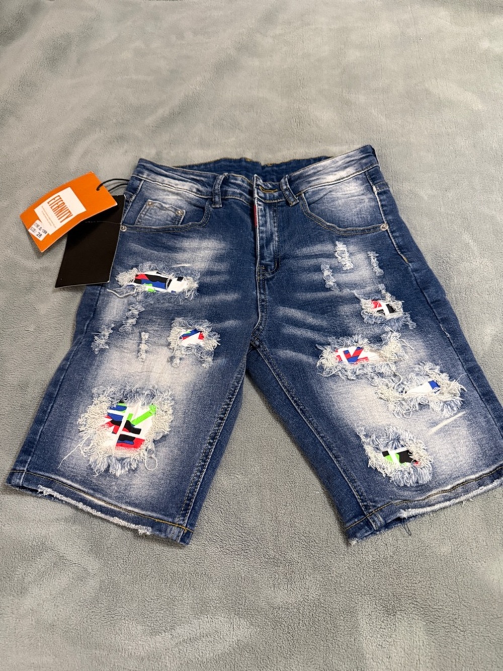 Modern Eternity Blue Distressed Denim Shorts with Multicolor Patch Accents